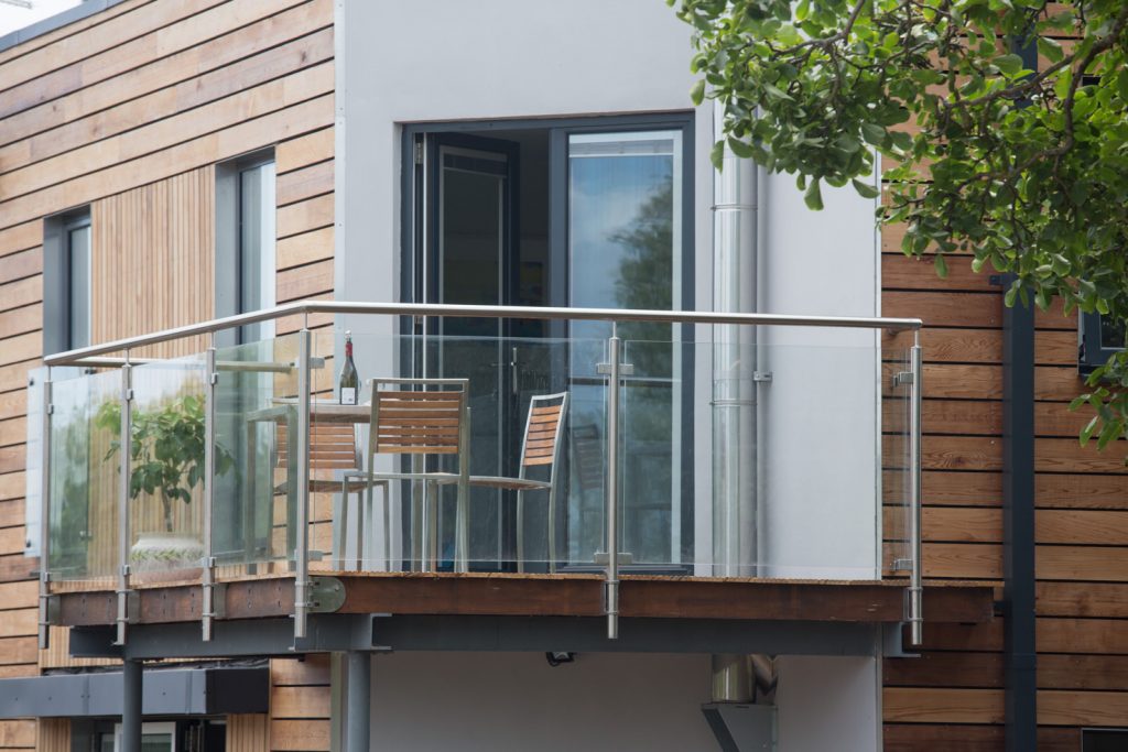 a beautiful balcony from outside of a building